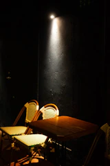 A warm, cozy setting with two chairs facing each other, symbolizing connection.