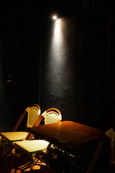 A warm, cozy setting with two chairs facing each other, symbolizing connection.