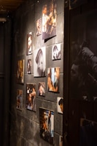 A collection of stylish haircuts displayed on a wall in Basits Salon.