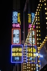 a street sign with chinese writing on it