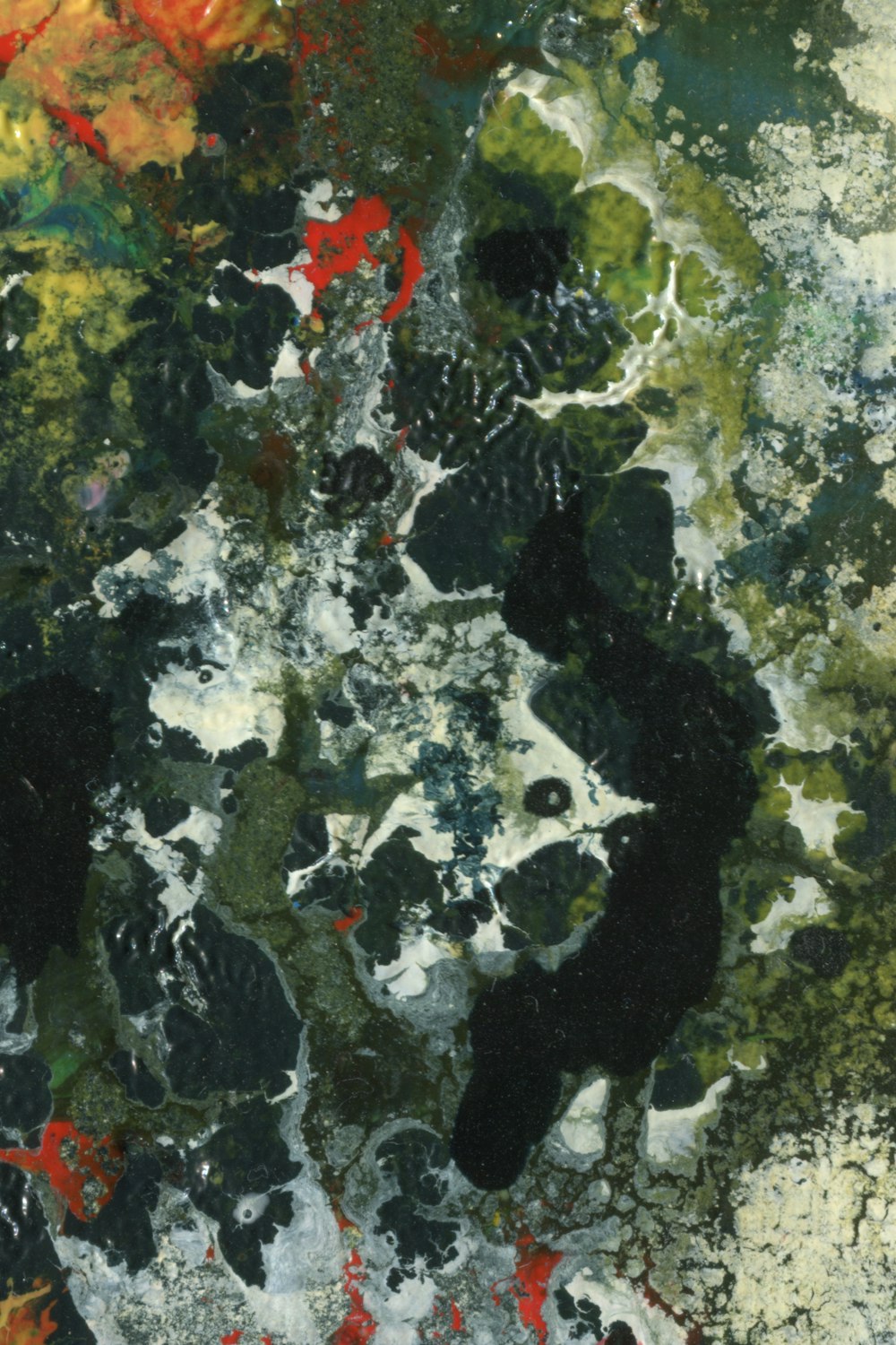 an abstract painting with black, green, and red colors