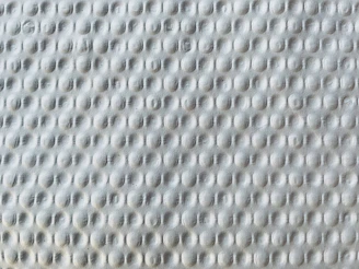 Close-up image of the Painless polyurethane cushion highlighting its soft texture.