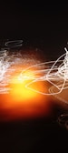 An abstract display featuring swirling lines of light in white and orange hues against a dark background, creating a sense of motion and energy.