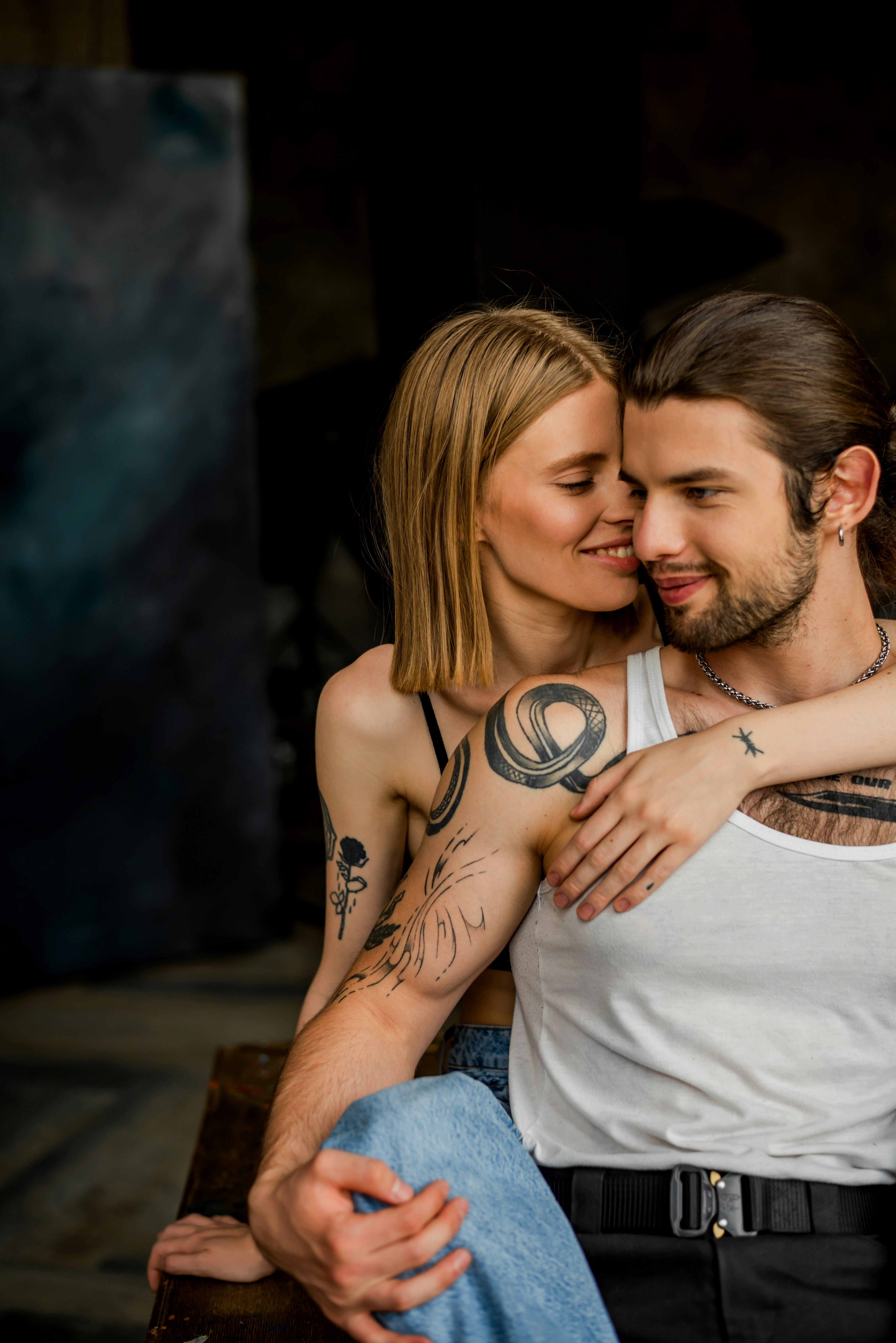 a man and a woman sitting next to each other