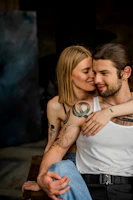 a man and a woman sitting next to each other