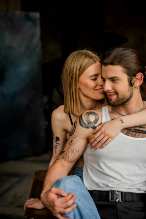 a man and a woman sitting next to each other