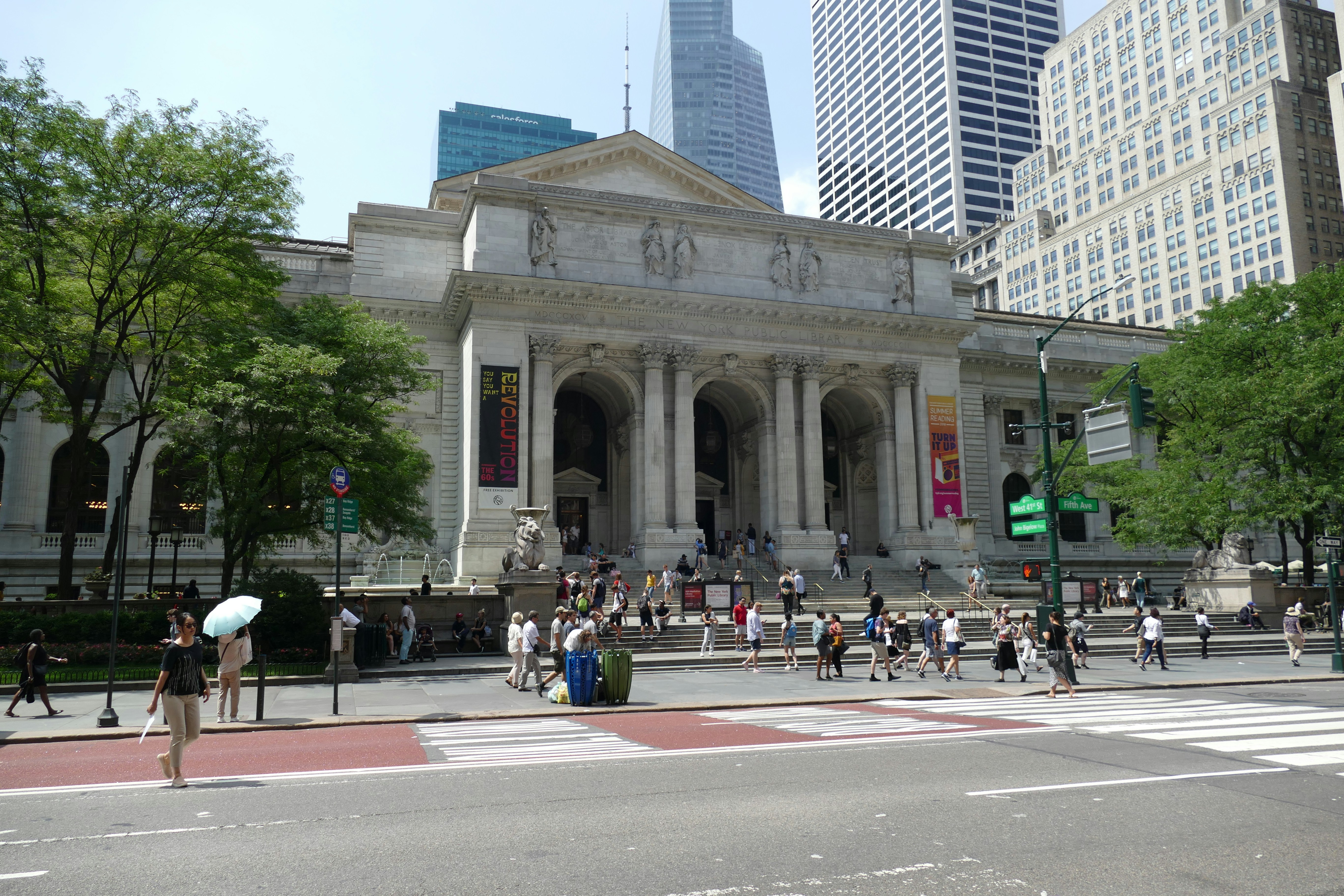 A group of people standing in front of a building