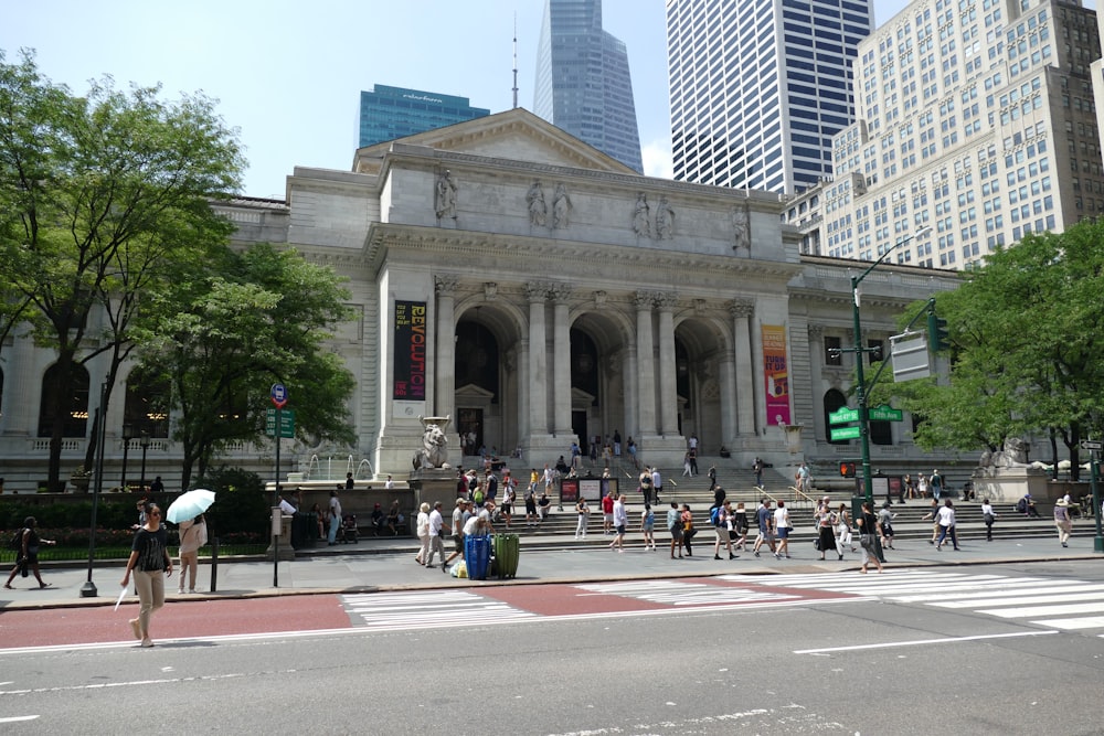 a group of people standing in front of a building