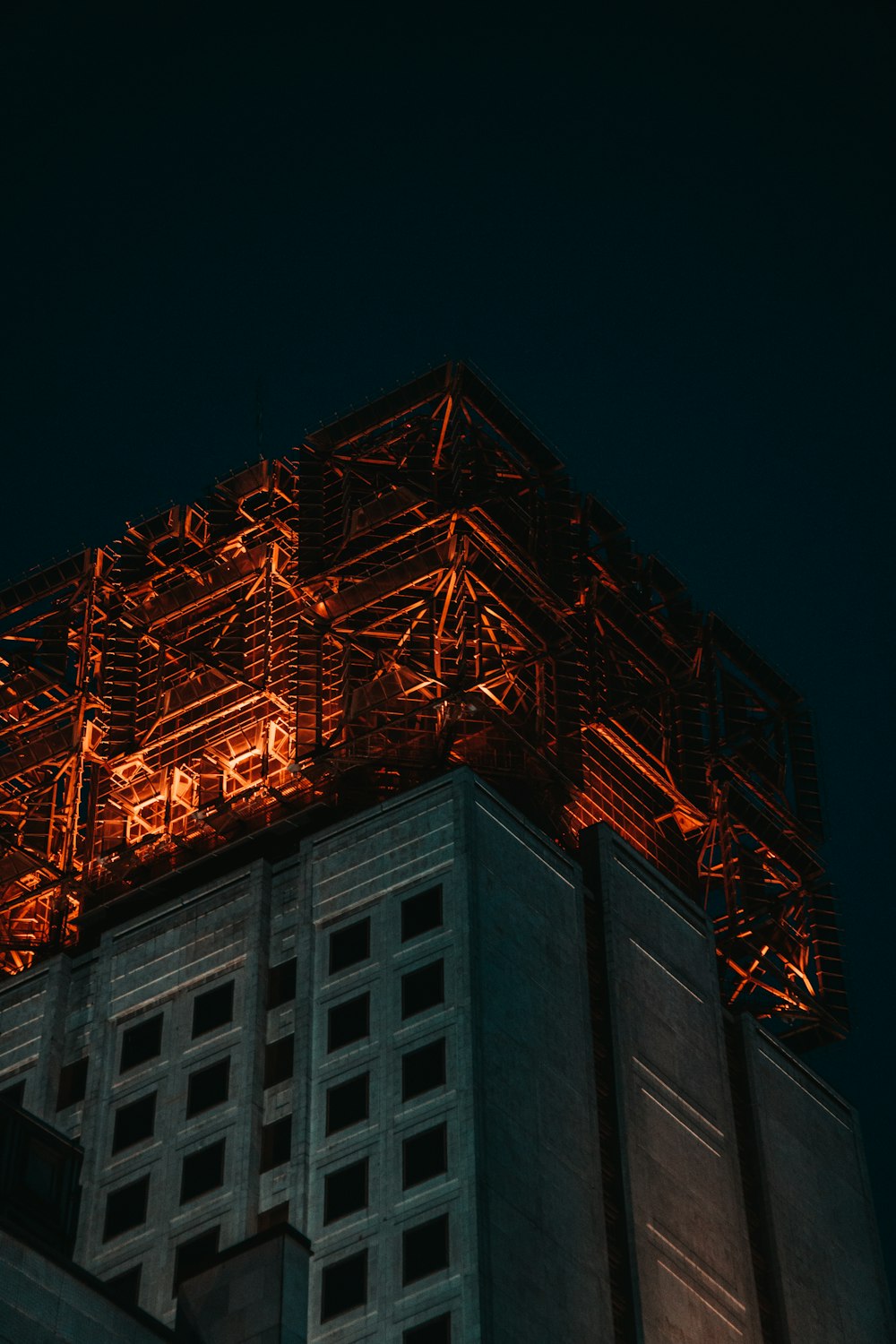 a tall building with scaffolding on top of it