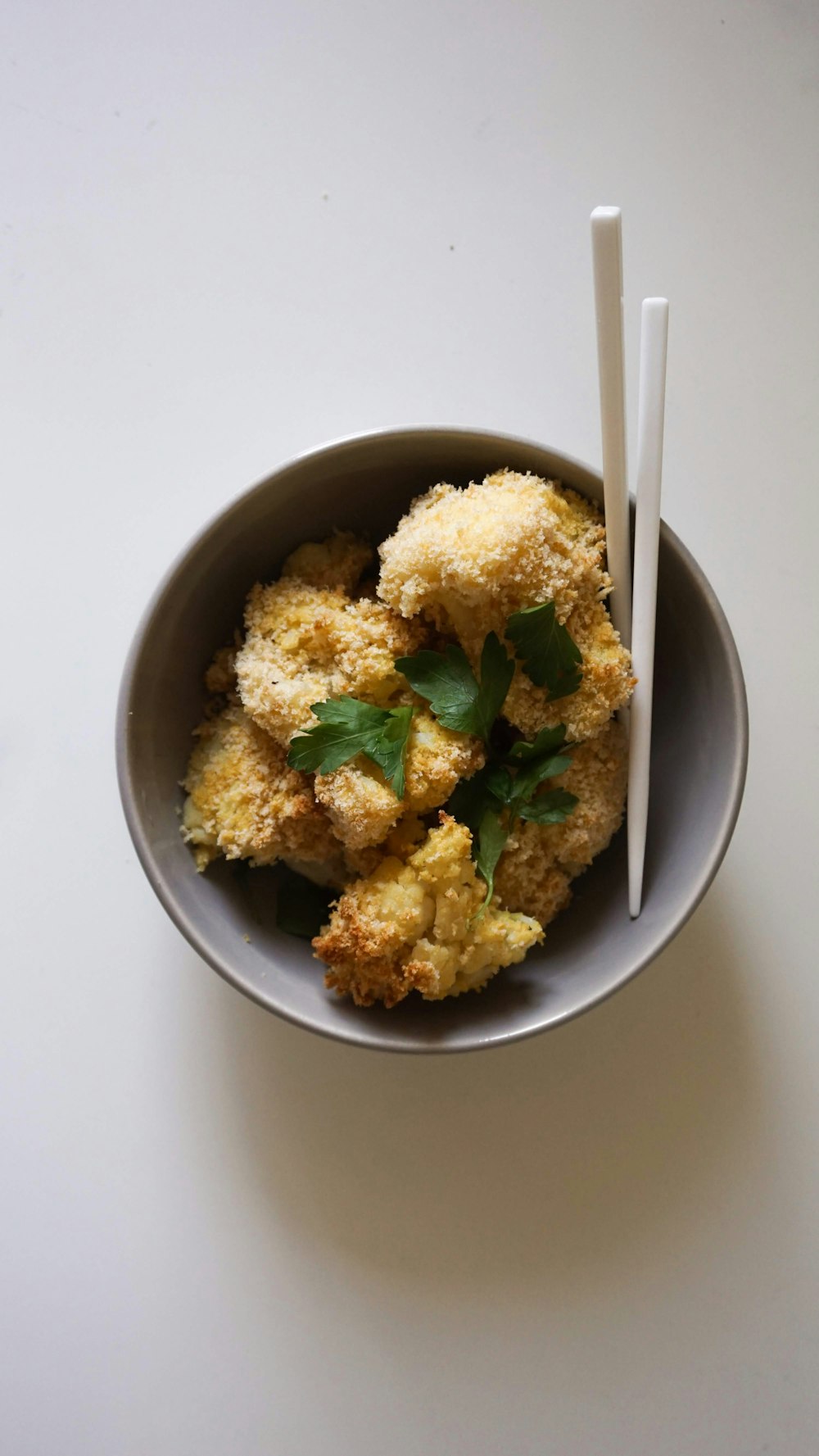 a bowl of food with a spoon in it