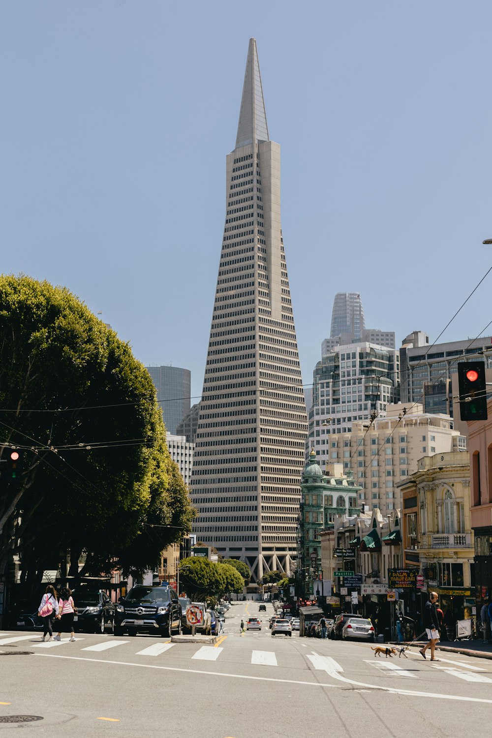 a very tall building towering over a city