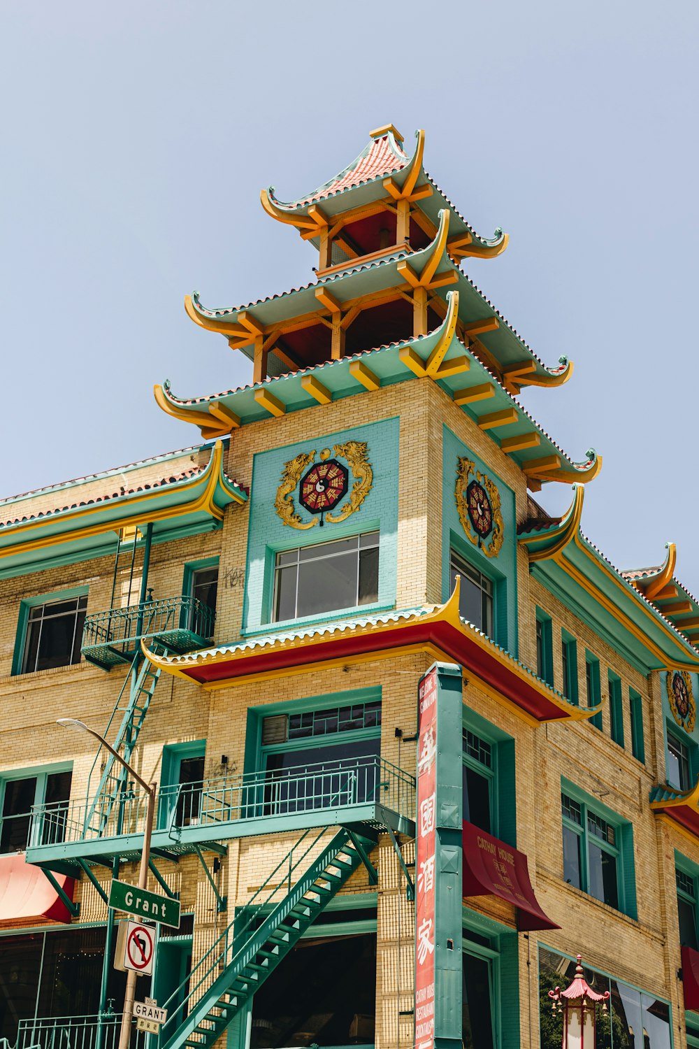 a tall building with a clock on the top of it