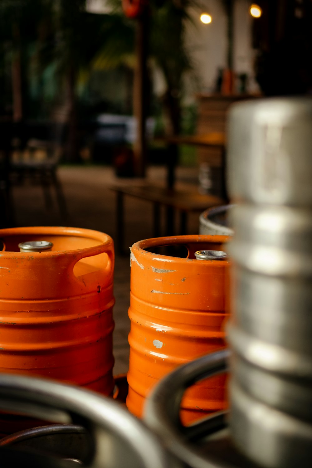 a couple of orange barrels sitting on top of a table