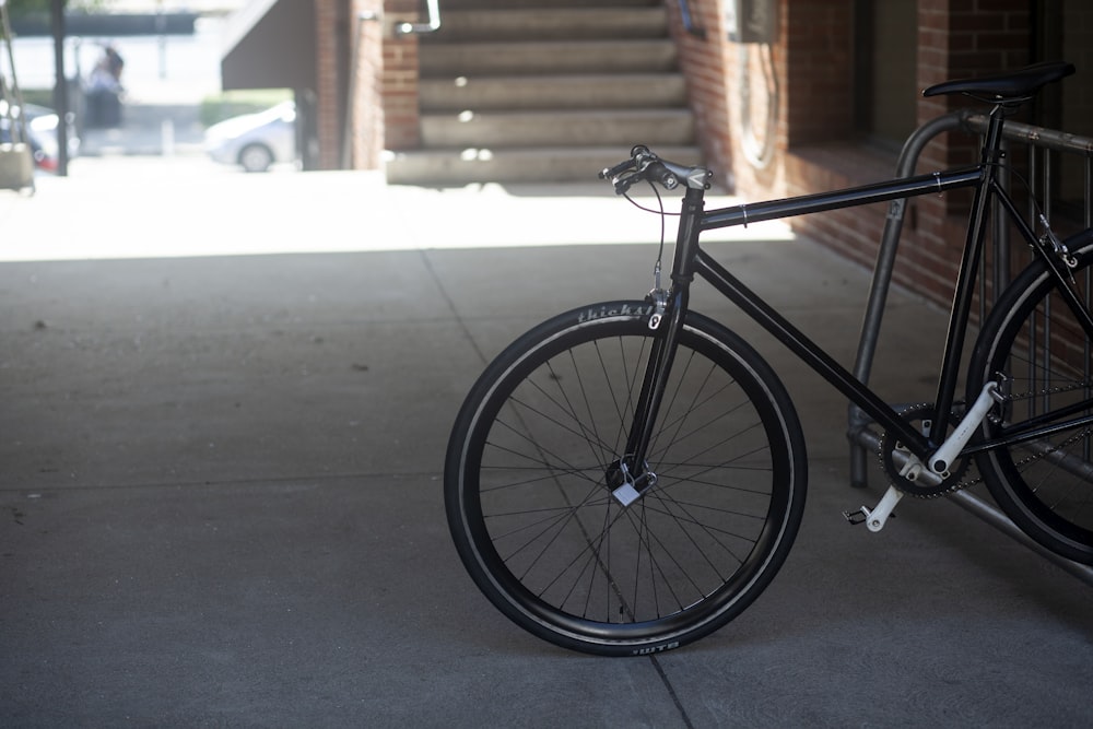 a bicycle parked in front of a building