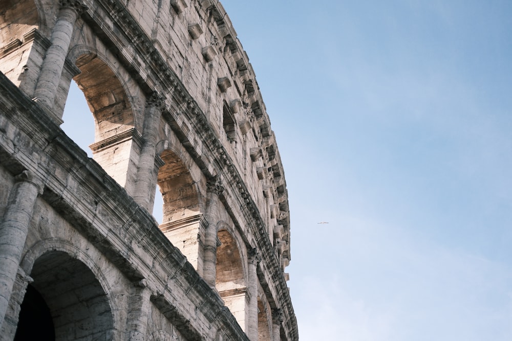 a close up of the side of an ancient building