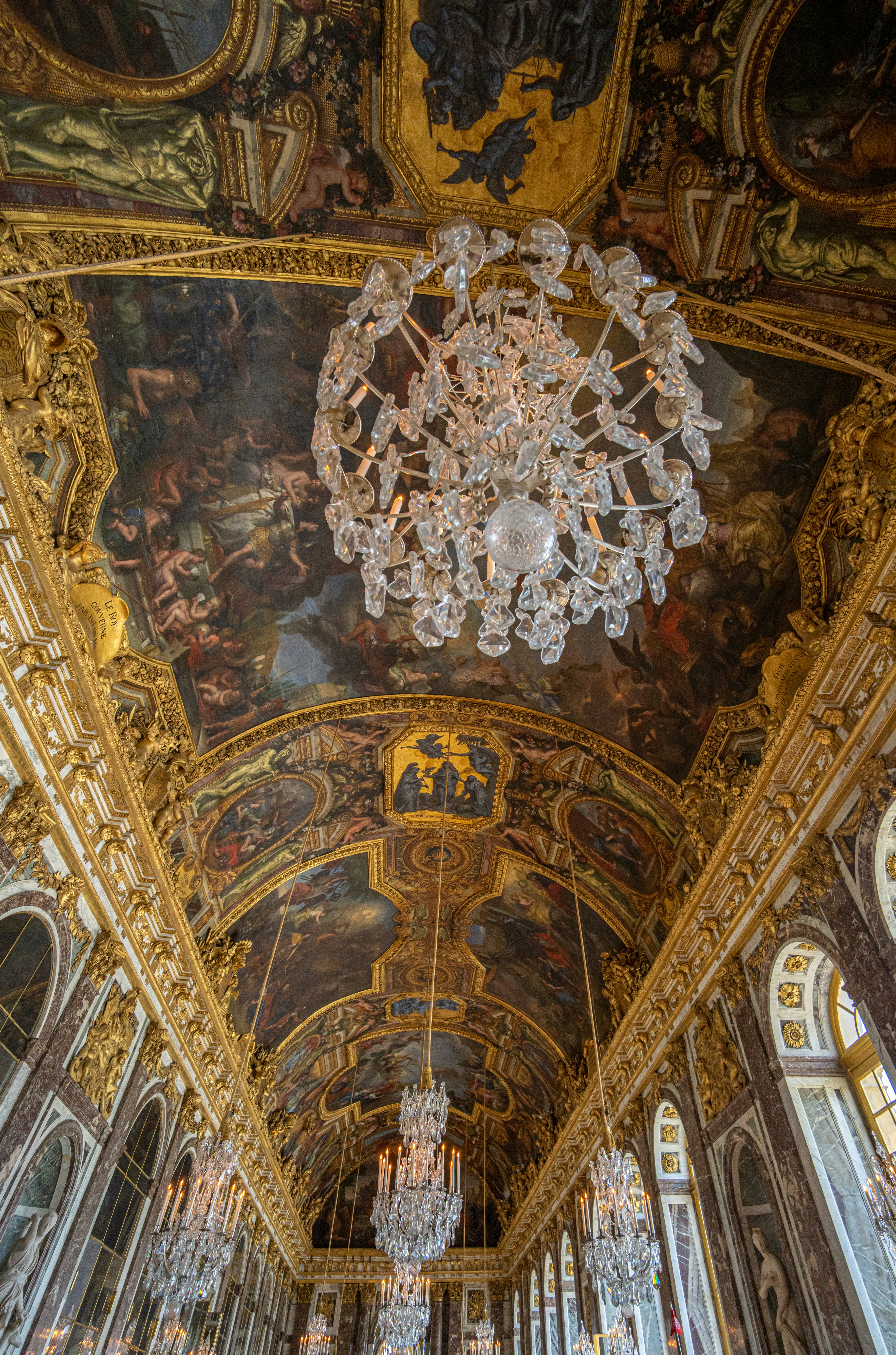 a chandelier hanging from the ceiling of a building
