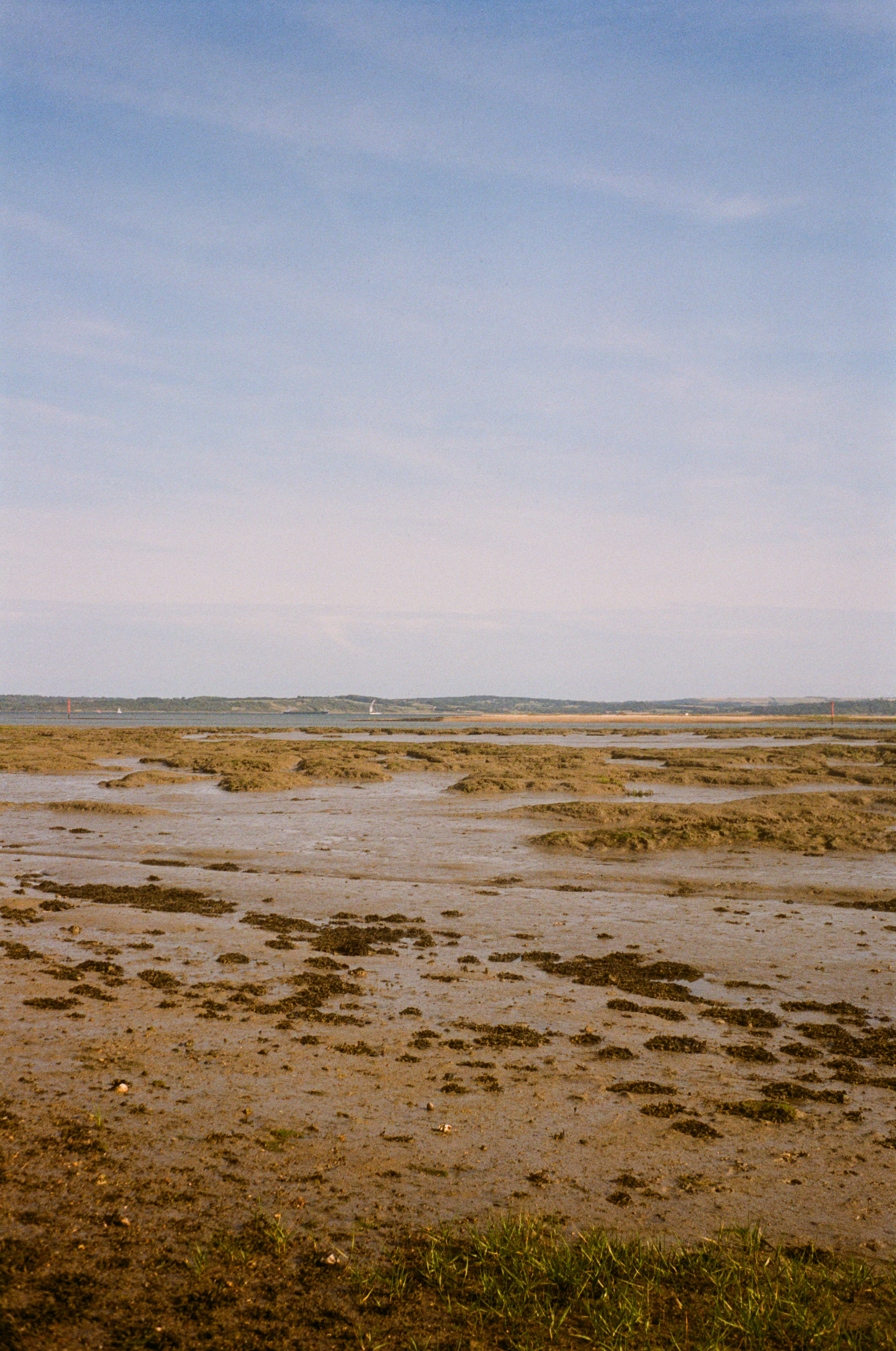 a man riding a horse on top of a sandy beach