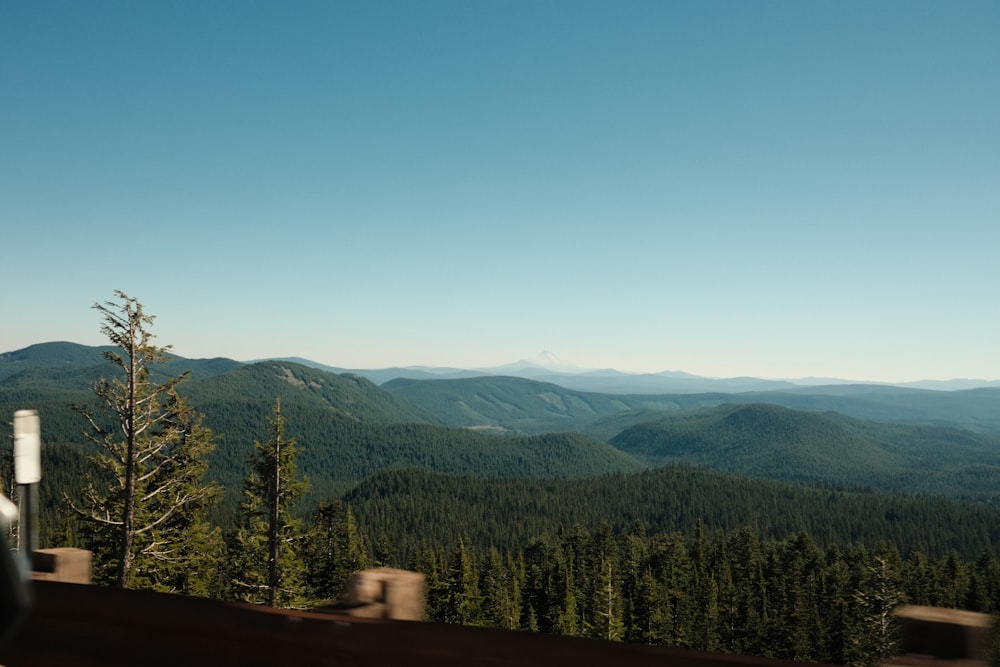 a view of a mountain range from a highway