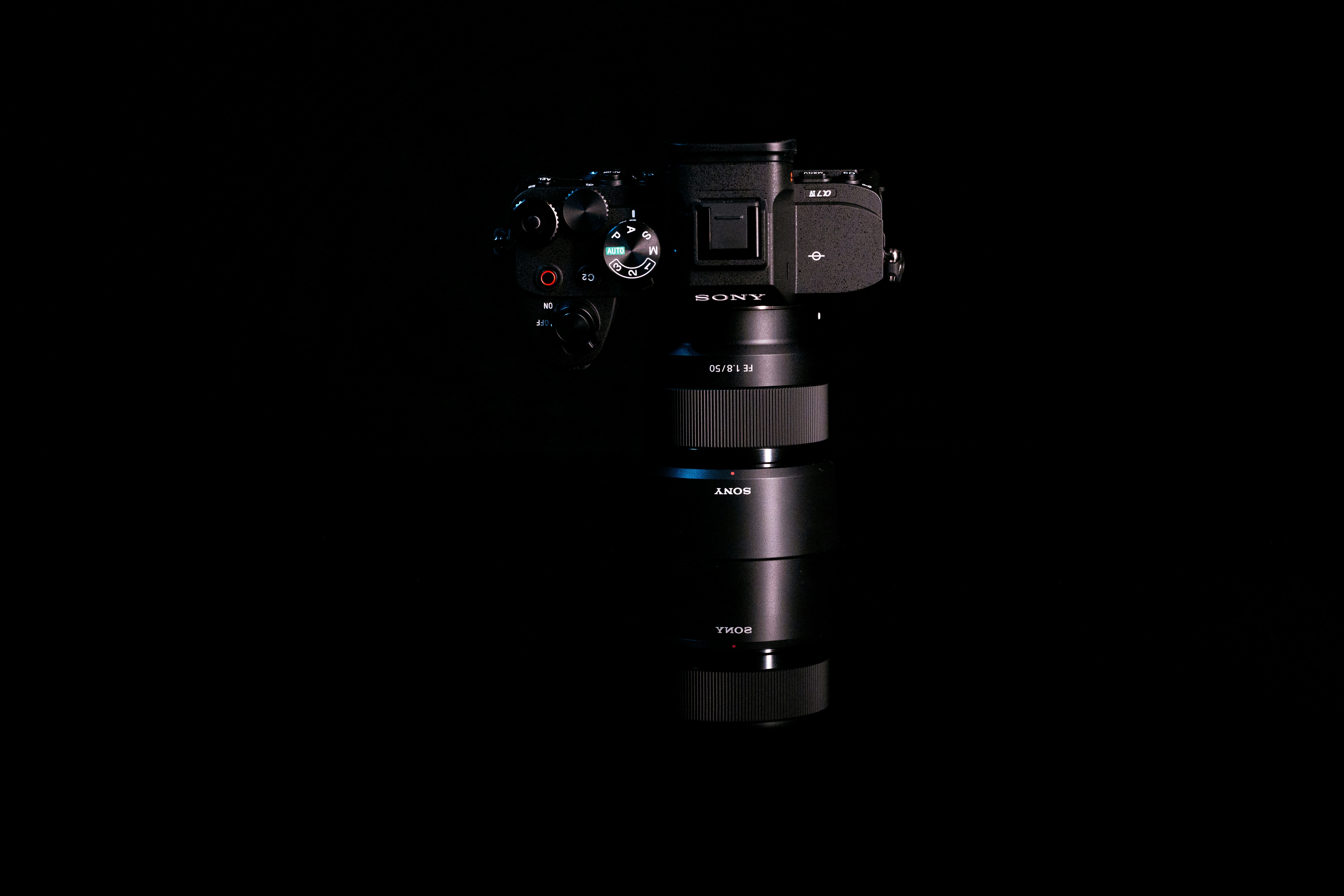 a camera on a tripod in the dark