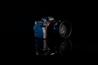 a camera sitting on top of a black table