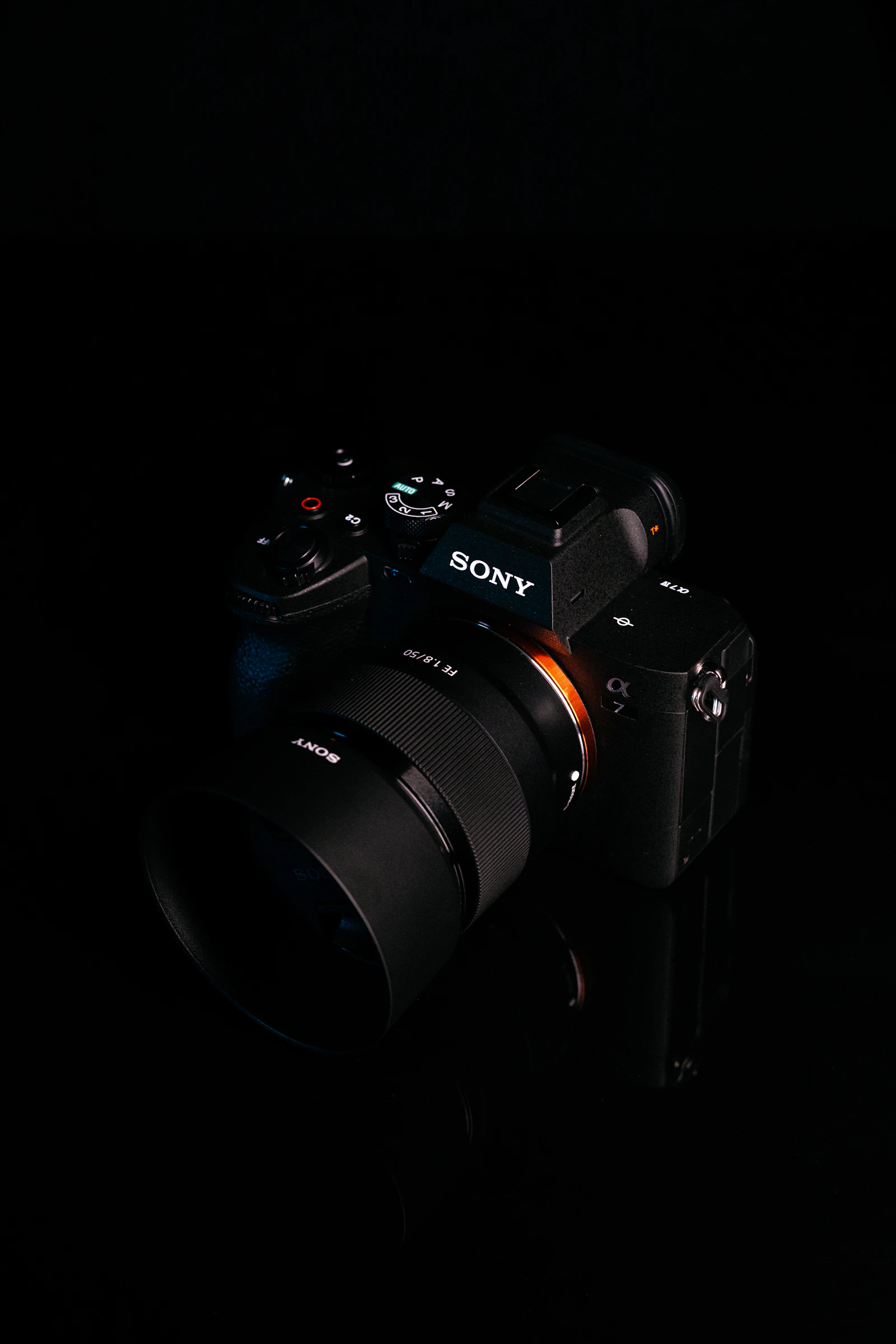 Sony Alpha camera angled, dark studio