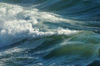 a close up of a wave in the ocean