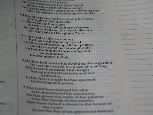 The image displays a page from a book with text in clear font. The content includes religious or biblical text, indicated by references to figures and places like the Lord and Zion. The page includes verse numbers and is formatted in a column with justified text. Dotted lines run along the edges, possibly for alignment or notes.