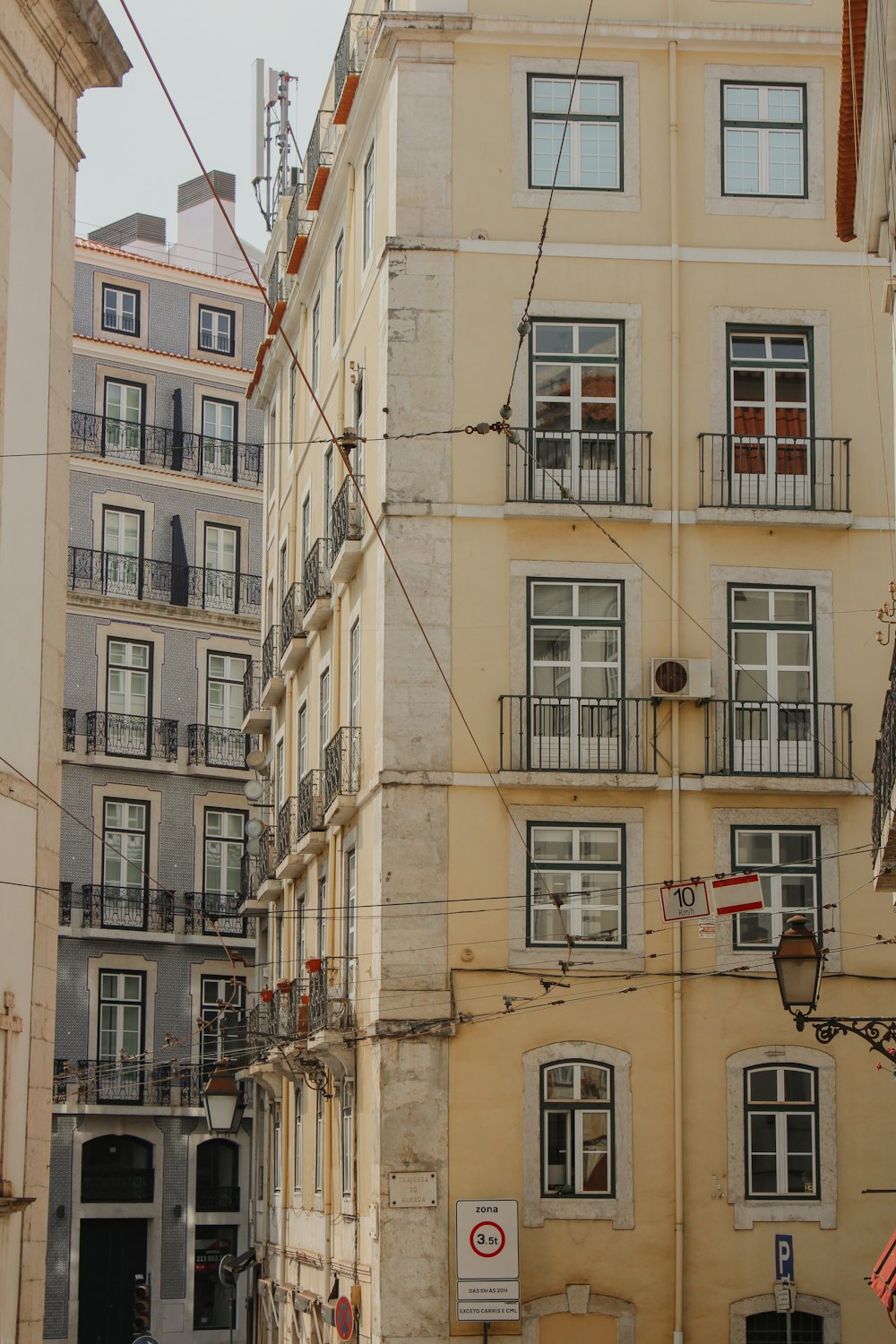 a group of buildings with balconies and balconies on them