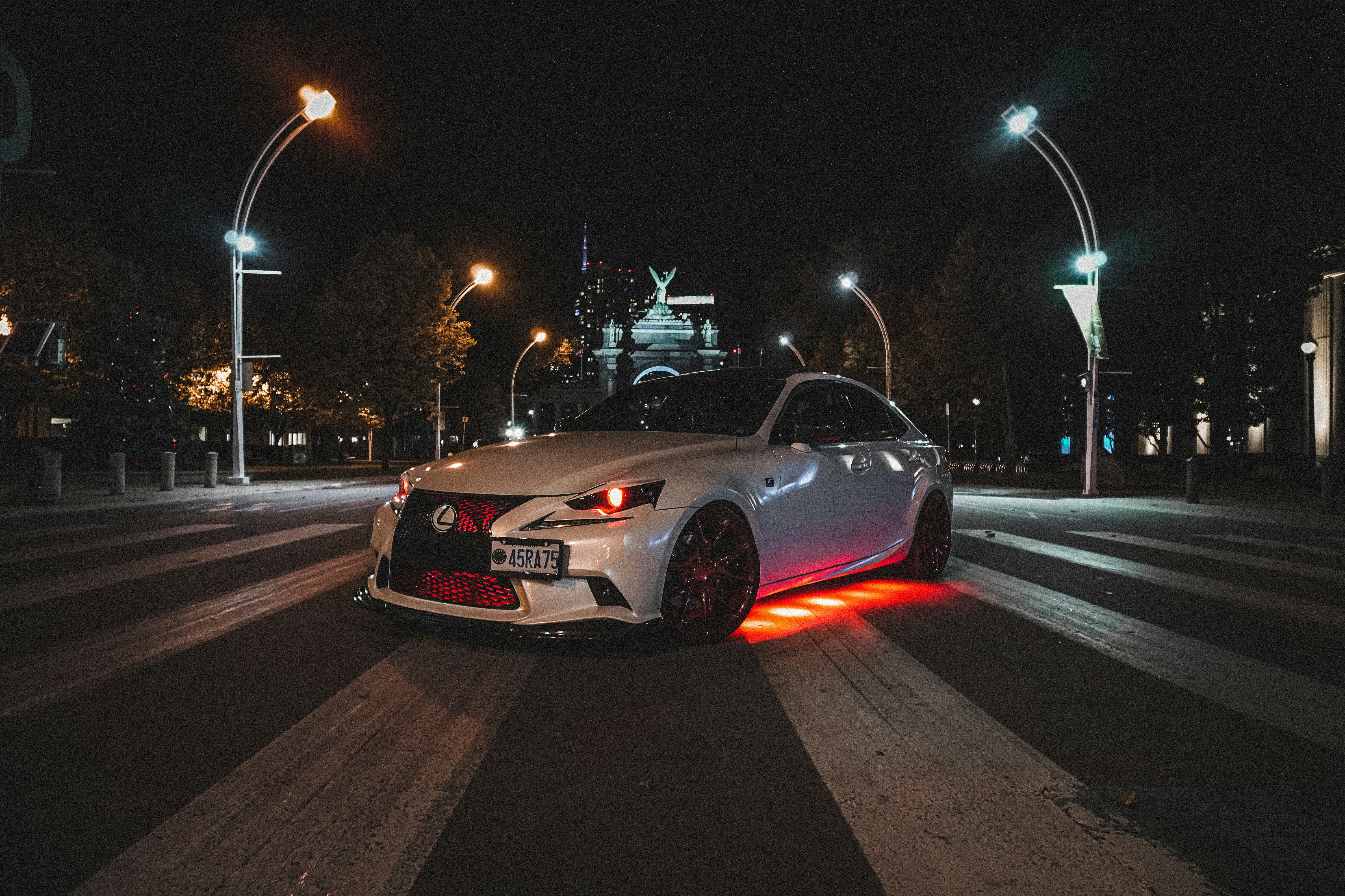 a white car parked on the side of the road