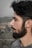 a man with a goatee and a beard