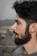 a man with a goatee and a beard