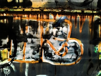 A vibrant urban artwork featuring metallic textures and electric blue strokes on a dark background.