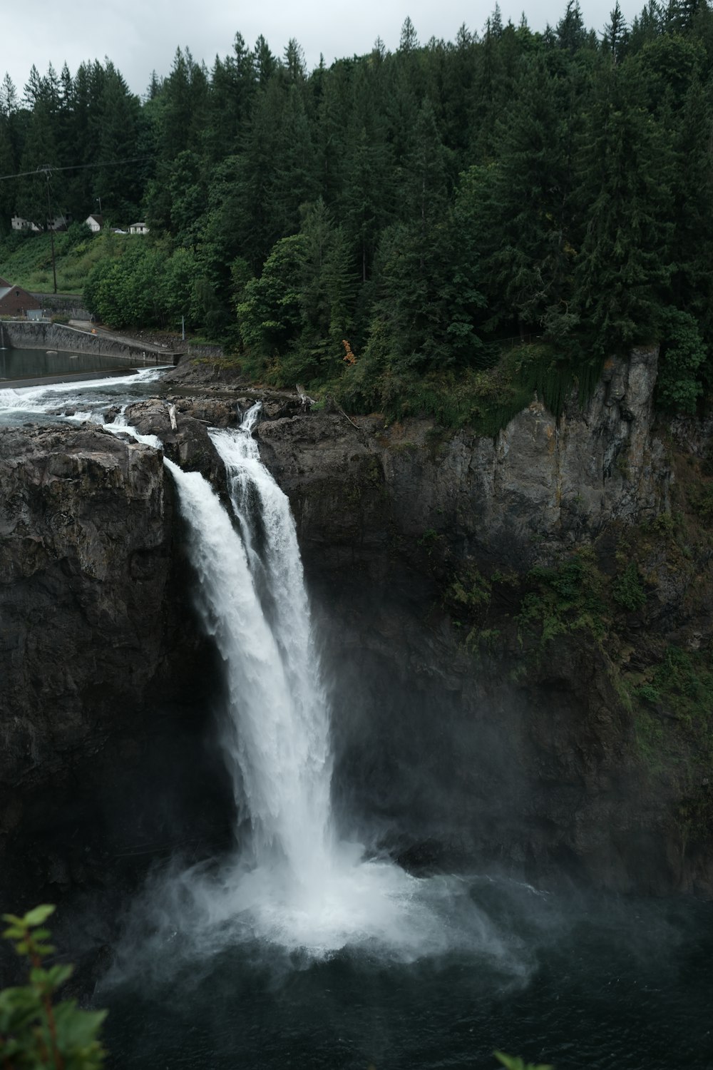 a waterfall with a large amount of water coming out of it