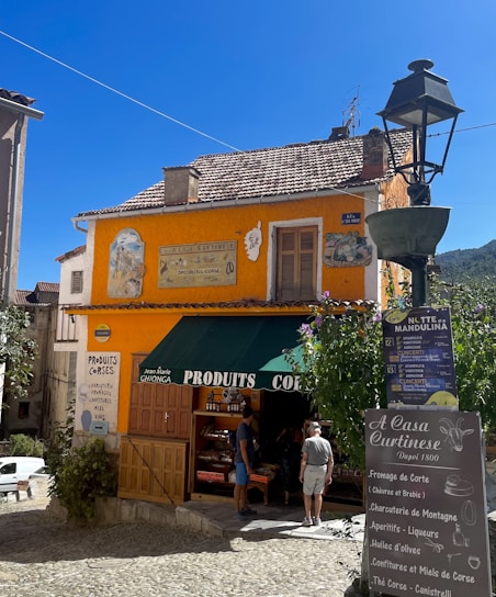 A friendly shopfront with a clear 'Relais Colis' sign in a Lyon neighborhood.