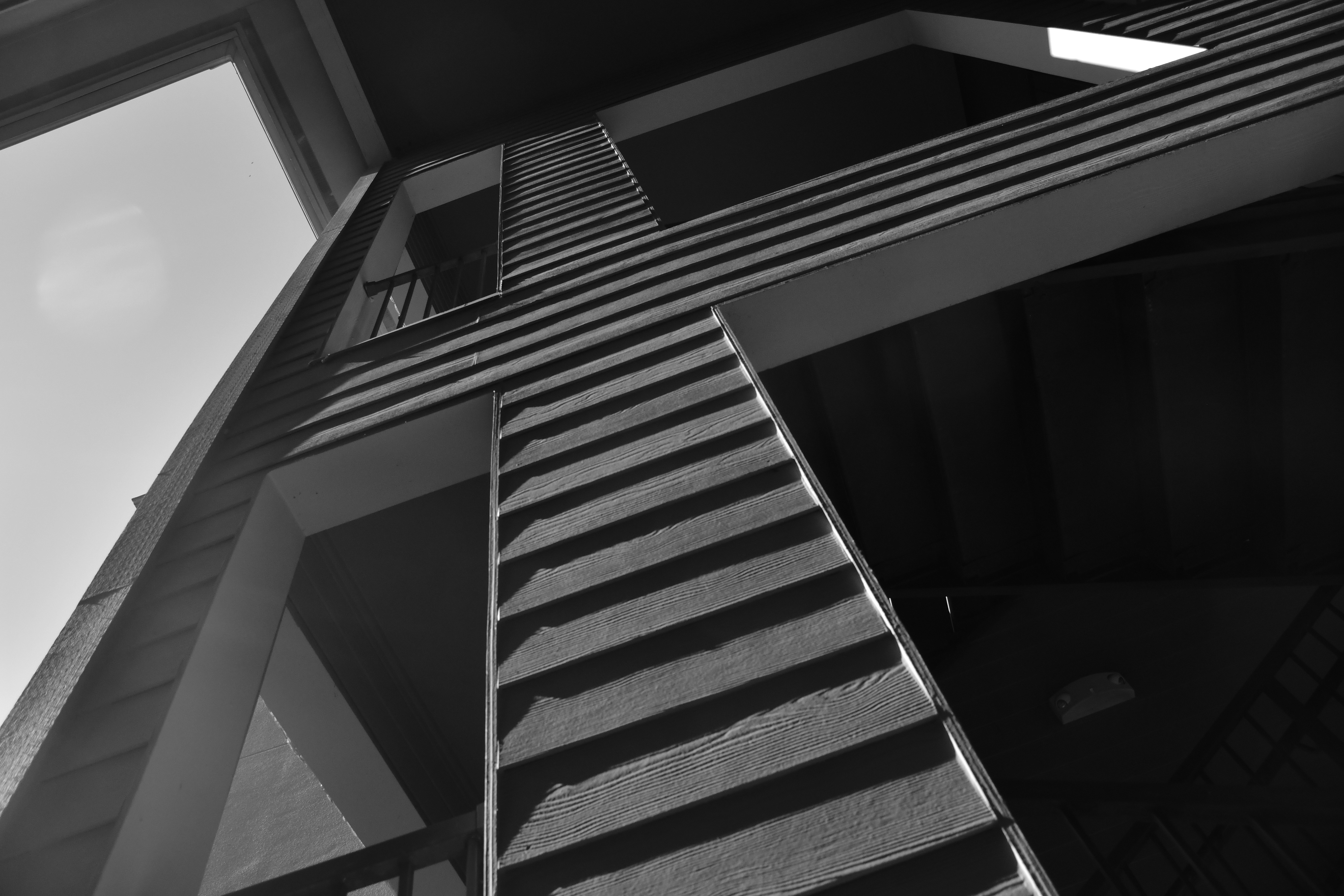 a black and white photo of a tall building