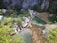 A scenic view of a lush tropical landscape in Bali with a winding path.