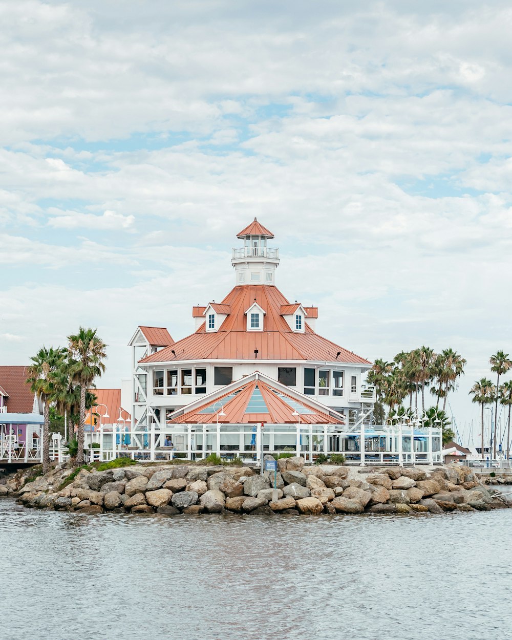 a large building sitting on top of a body of water