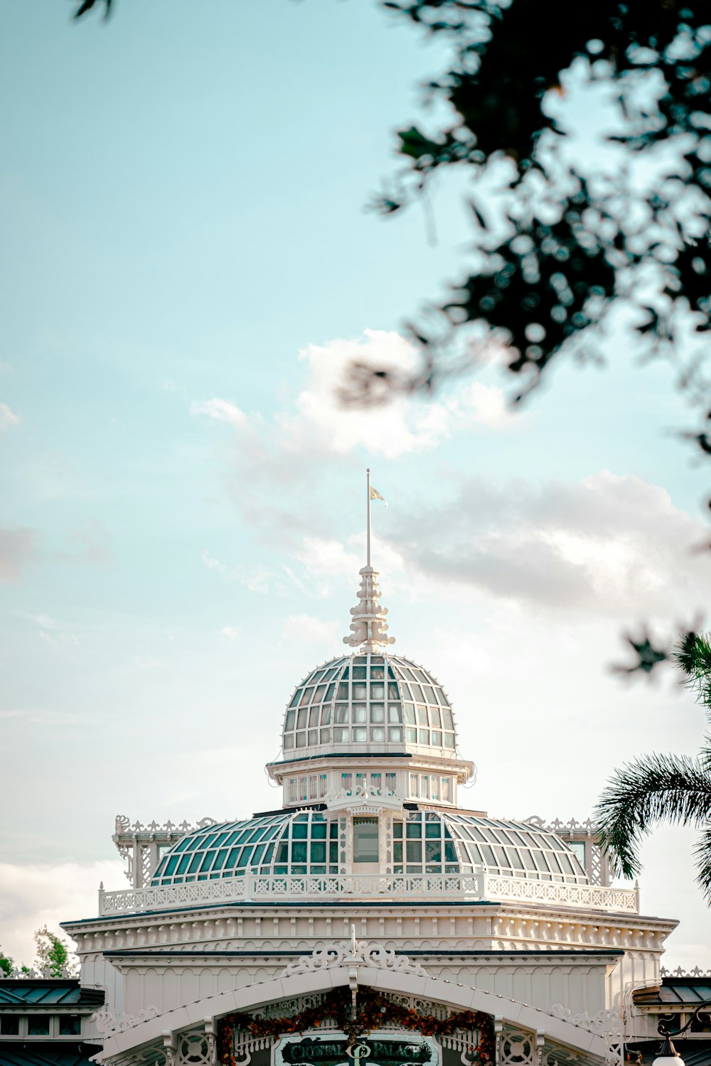 a large white building with a glass roof