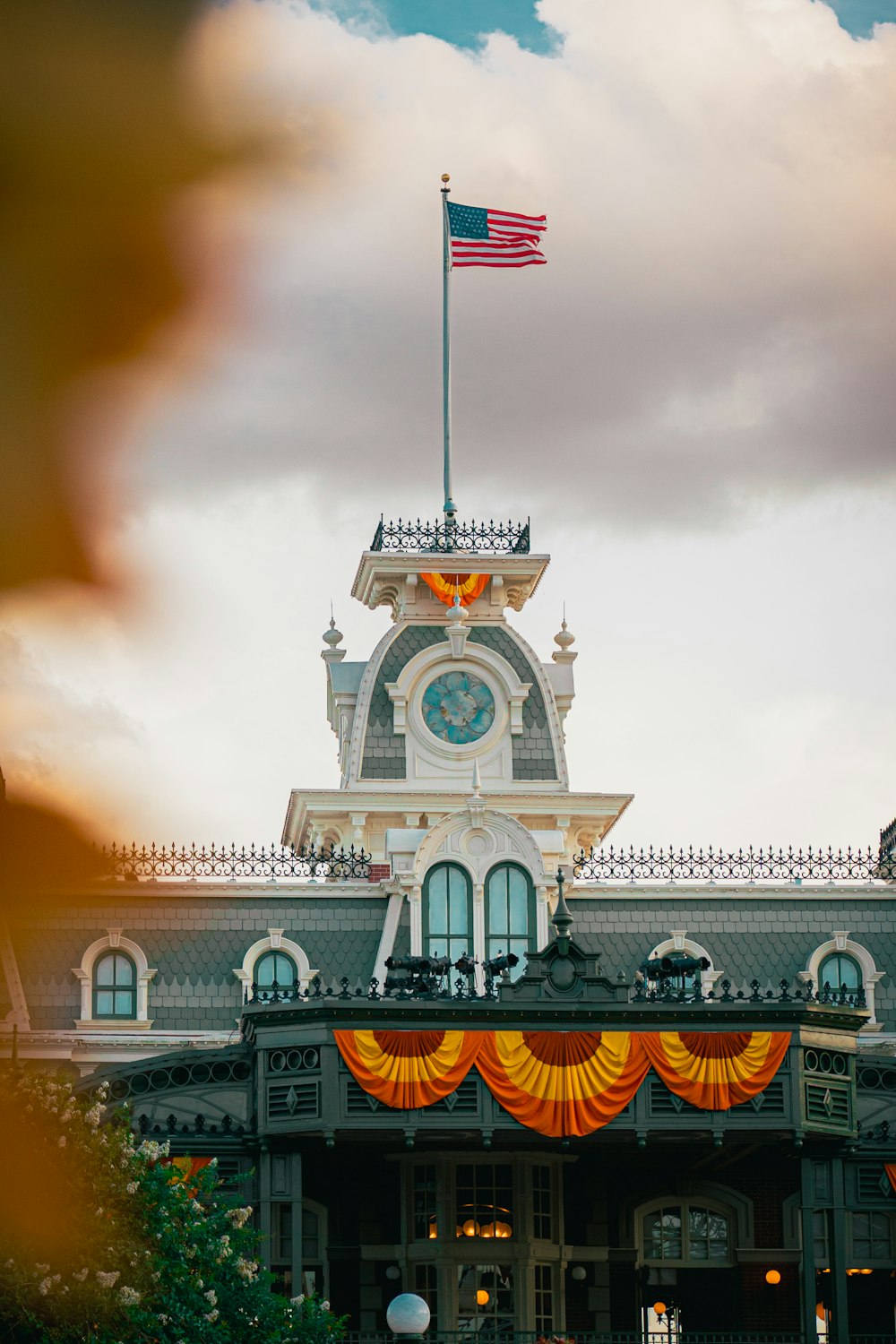 a large building with a flag on top of it