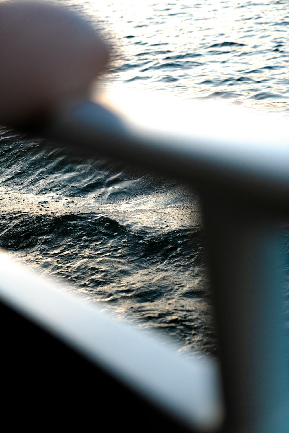 a person riding a boat on a body of water