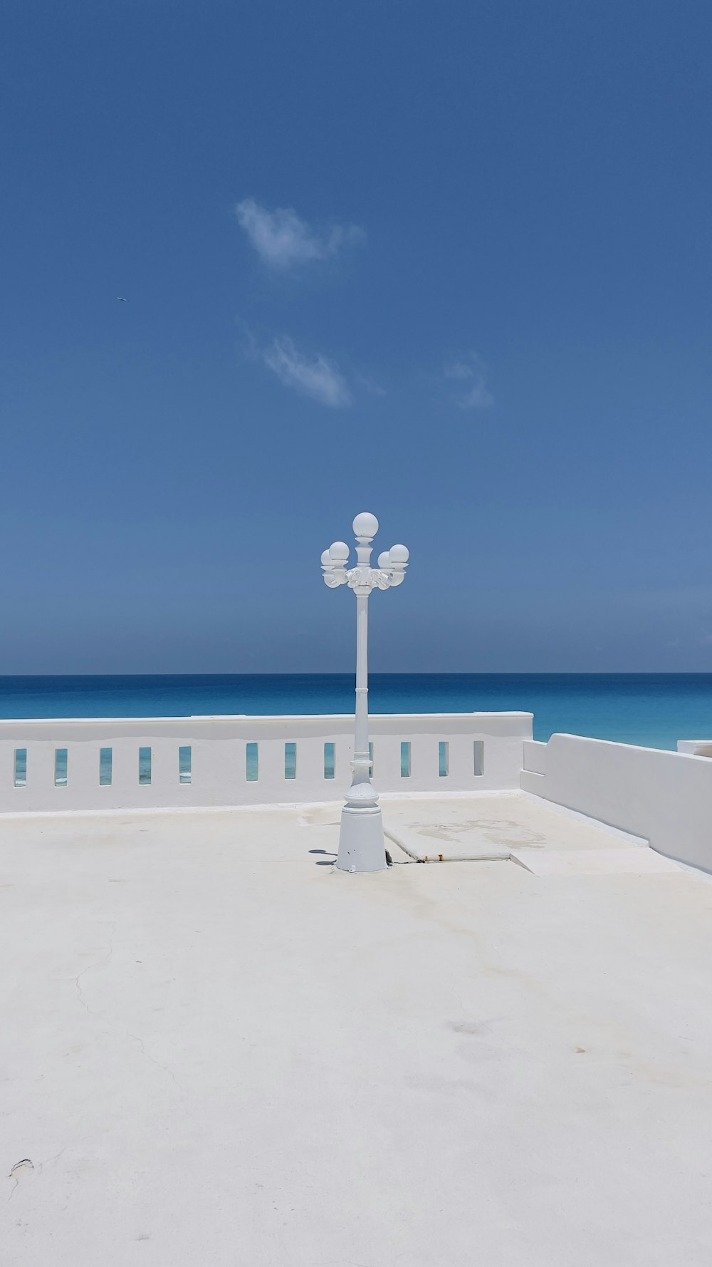 a view of the ocean from the roof of a building