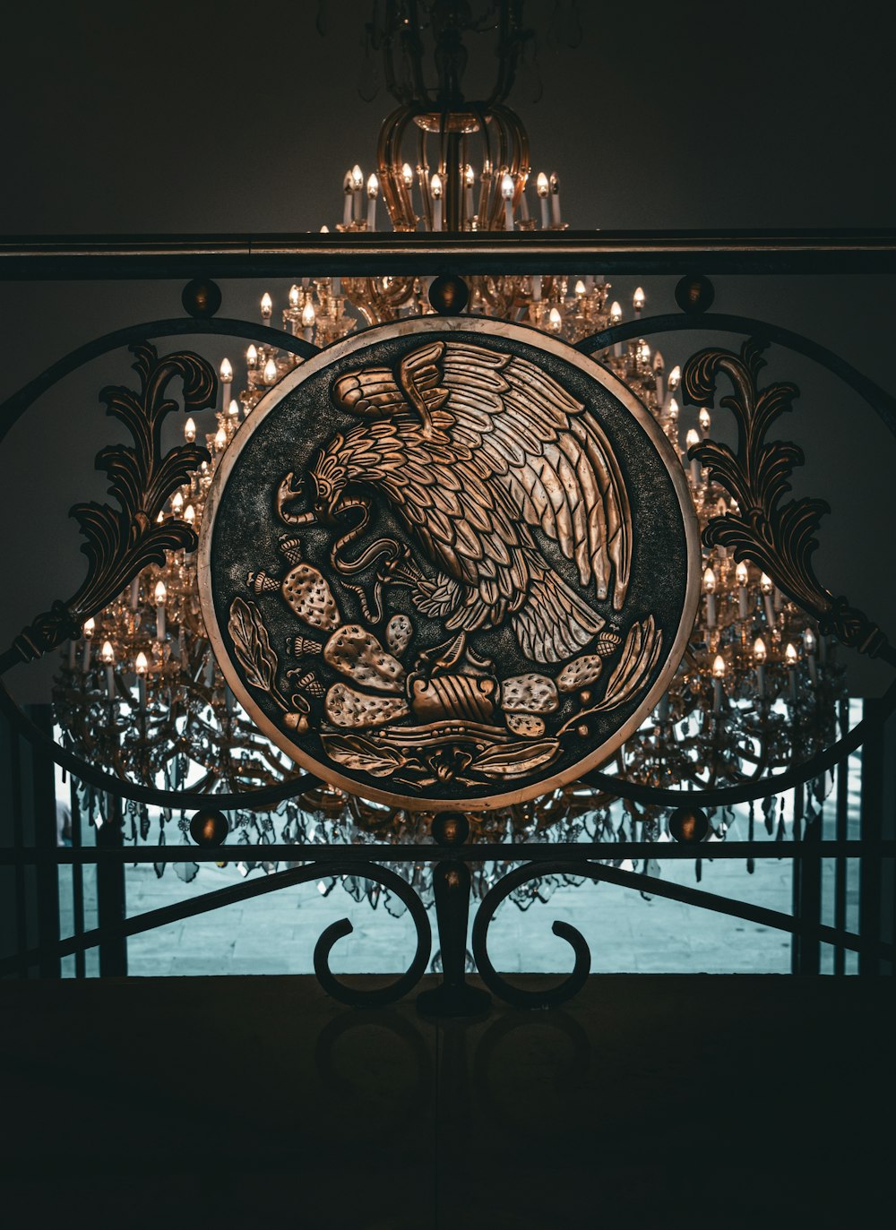a chandelier with a picture of an eagle on it