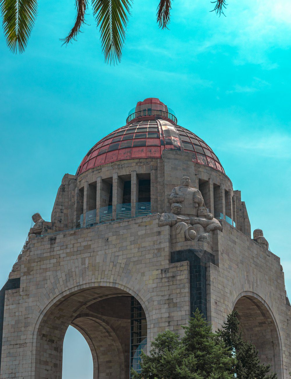 a large stone structure with a dome on top