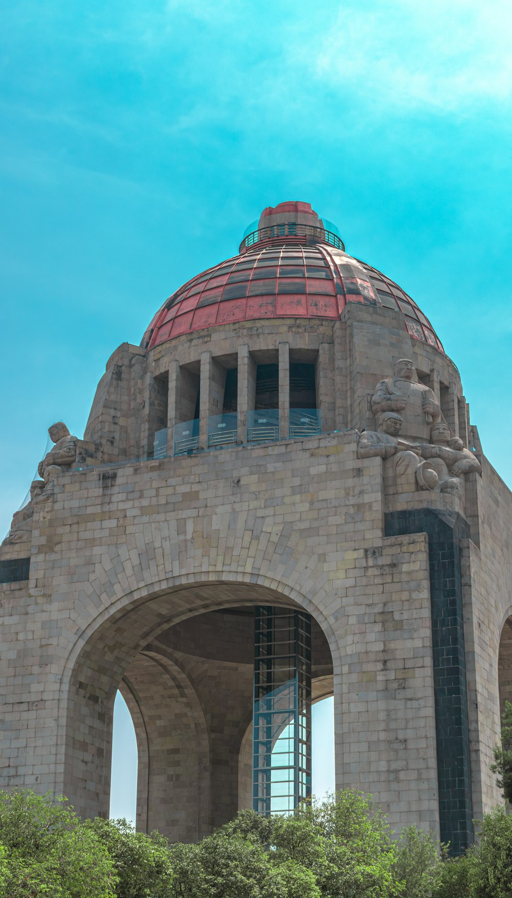 a large stone structure with a dome on top