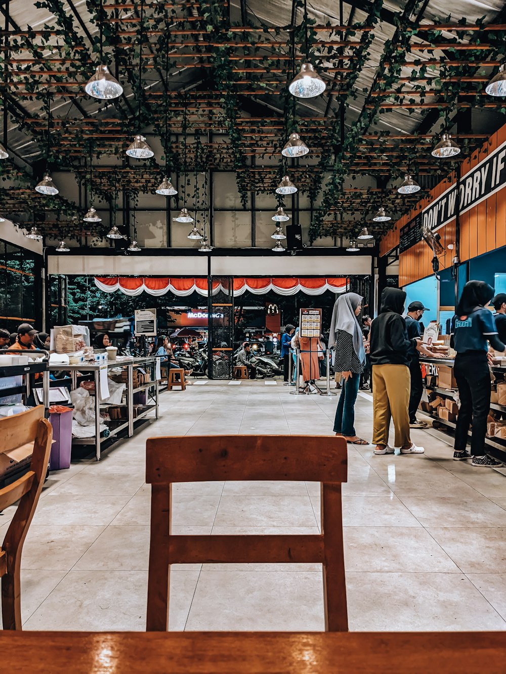 a group of people standing around a store