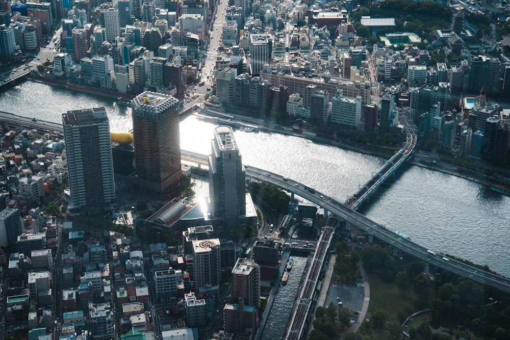 an aerial view of a city and a river
