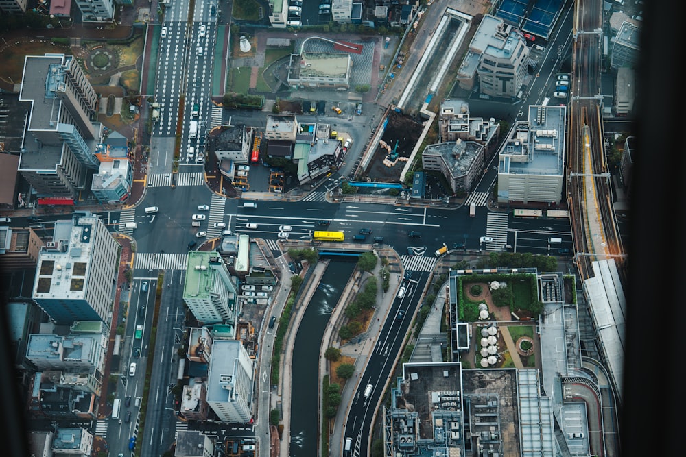 an aerial view of a street intersection in a city