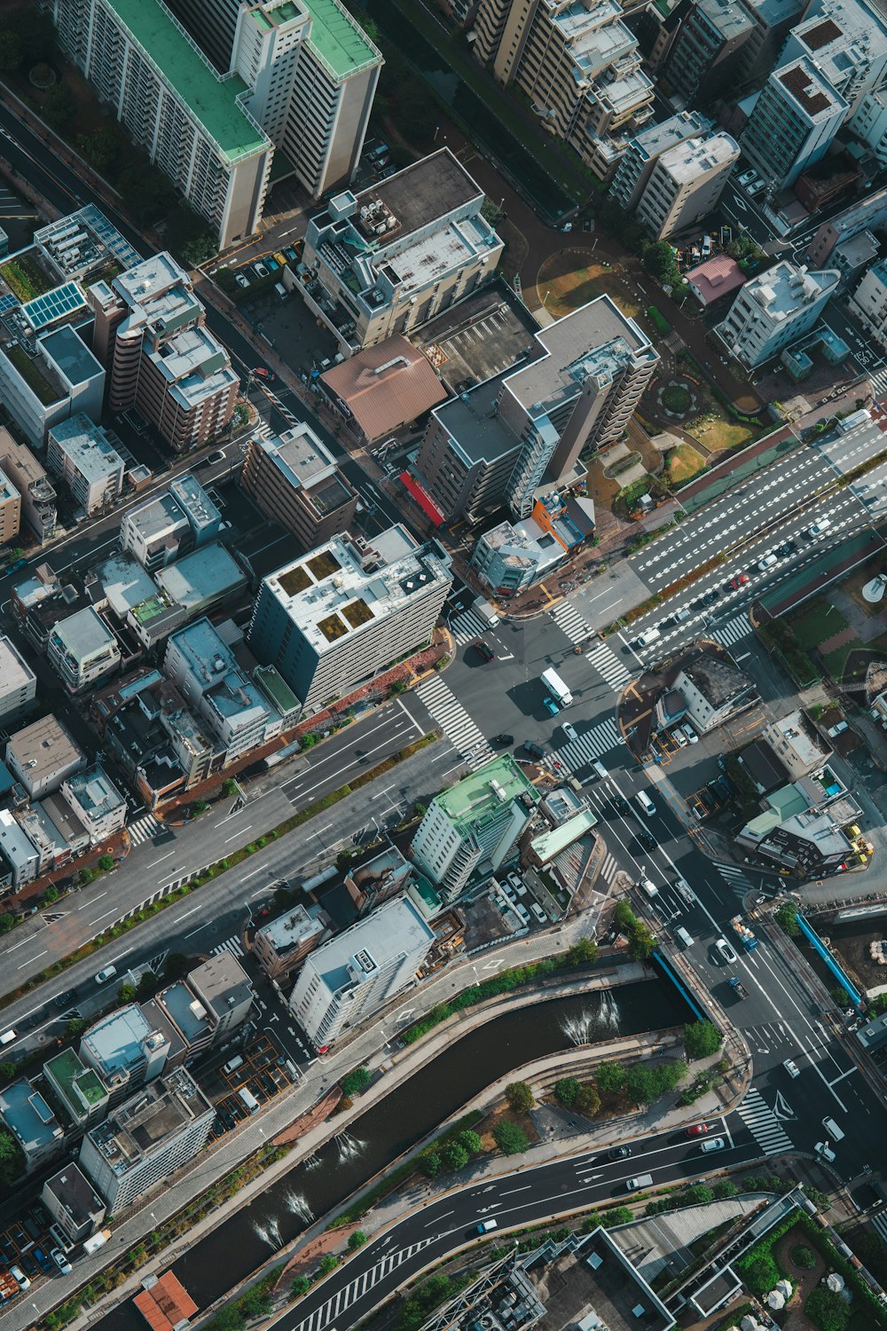 an aerial view of a city with a freeway