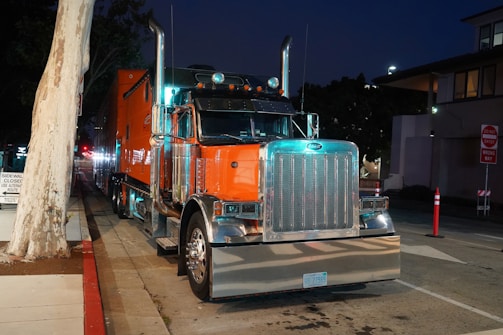 a semi truck parked on the side of the road