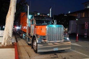 a semi truck parked on the side of the road